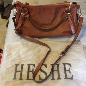 Heshe crossbody purse with dust bag